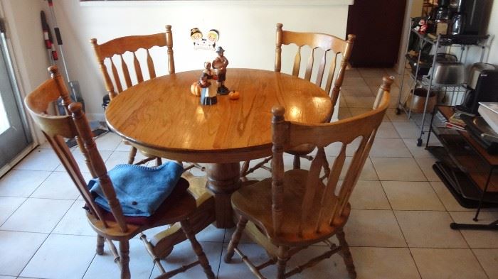 Oak kitchen table and 4 chairs.    