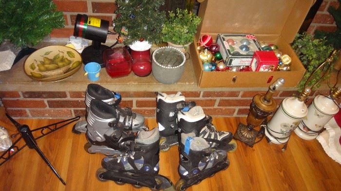 Roller blades,  Christmas tree stands, lamps, little trees, misc. 