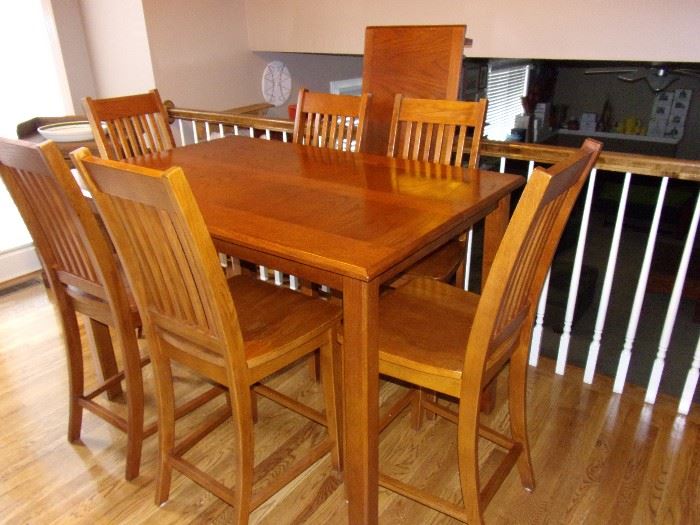 Stunning table top Mission style counter/pub height table with 2 leave and 6 chairs