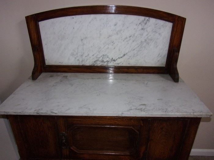 Marble top and back buffet/server/wash stand with barley twist legs and castors