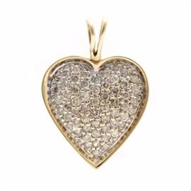 14K Yellow Gold 1.08 CTW Diamond Heart Pendant: A 14K yellow gold 1.08 ctw diamond pendant. This pendant features fifty-eight round brilliant cut diamonds set within a heart shape.