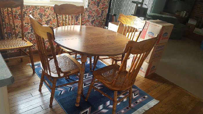 $225  Round kitchen table with chairs and leaf  measures 38"