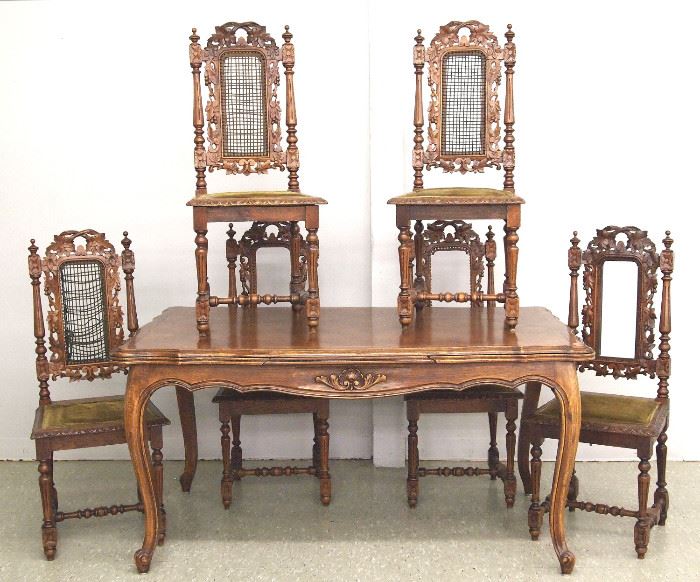  French oak dining table and 6 carved chairs