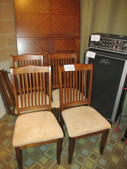 Beautiful dining table and chairs with Peavey amplifier and power modulator