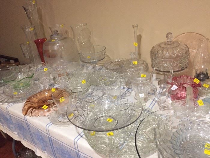 Lots and lots of antique, vintage and new glass serving pieces