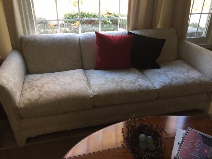 White custom designed white sofa and love seat.  Very Very clean.