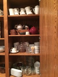Tons of serving pieces, and teapots