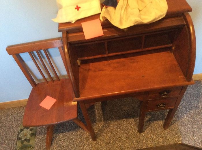 Antique child’s roll top desk and matching chair