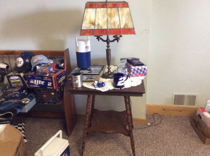 Antique table and part of a large collection of NASCAR signed pieces many signed by Rusty Wallace