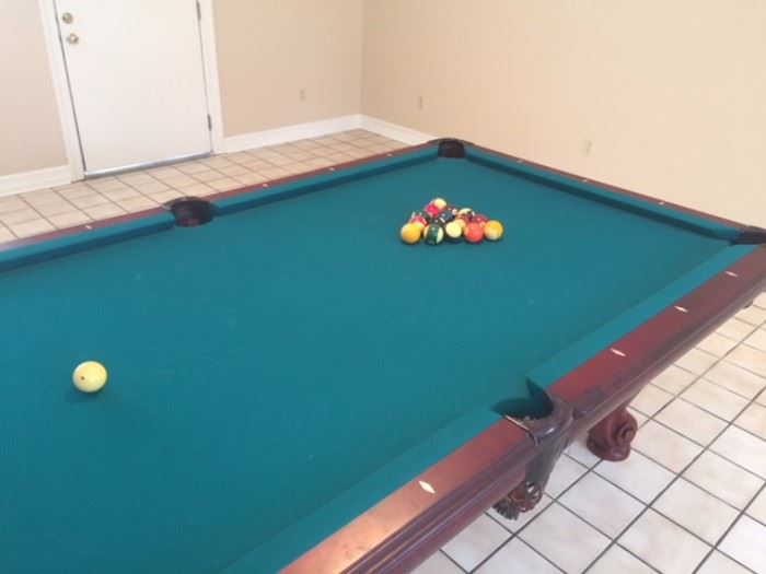 Pool table with leather pockets