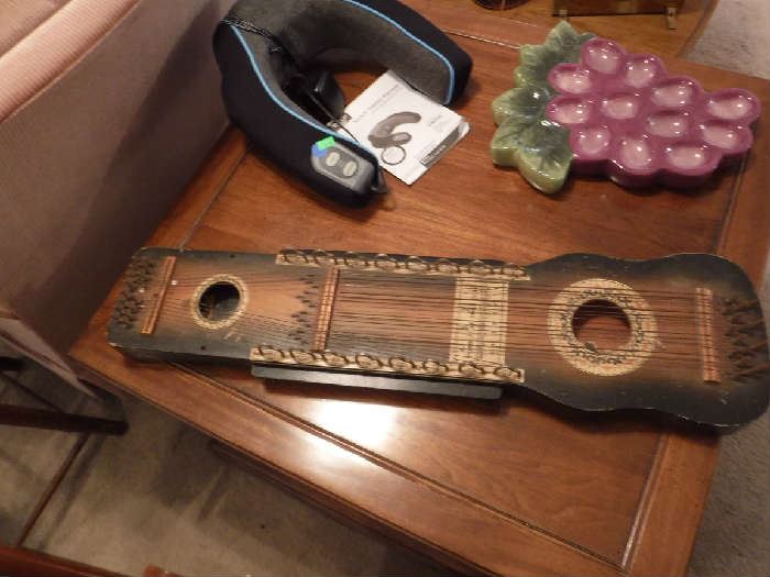 Dulcimer I think and most opinions agree but one said auto harp hmmm