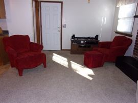 Matching set of two red chairs and an ottoman/tv-entertainment stand