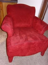 Matching set of two red chairs and an ottoman