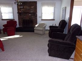 Two dark brown La-z-Boy recliners