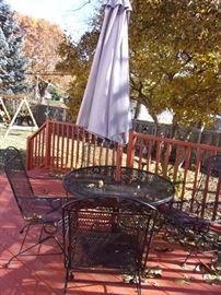 Party on the Patio - Long lasting wrought iron! Two wrought iron tables with 4 spring action chairs and umbrella, two wrought iron glider loveseats, two side wrought iron chairs with two small round wrought iron end tables and wrought iron tea cart
