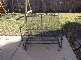 Party on the Patio - Long lasting wrought iron! Two wrought iron tables with 4 spring action chairs and umbrella, two wrought iron glider loveseats, two side wrought iron chairs with two small round wrought iron end tables and wrought iron tea cart