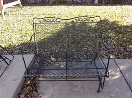 Party on the Patio - Long lasting wrought iron! Two wrought iron tables with 4 spring action chairs and umbrella, two wrought iron glider loveseats, two side wrought iron chairs with two small round wrought iron end tables and wrought iron tea cart