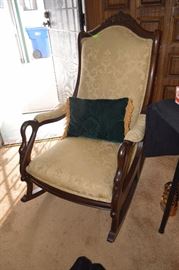 Old padded rocking chair