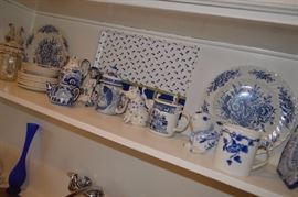 Mix and match blue and white dishes, cups and tea pots