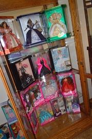 with lots of Barbie dolls and others...