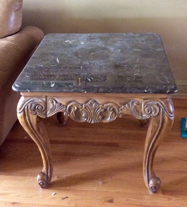 Carved end table with granite top
