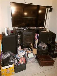 Here is one of our entertainment sections: flatscreen TV, stereo and audio components, records and accessories