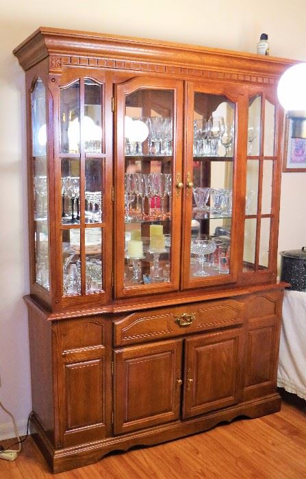 China Cabinet  with wine glasses, bar glasses and misc glassware. 