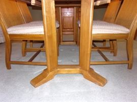 Dining room table with 6 wicker back chairs(2 captain not pictured and china cabinet