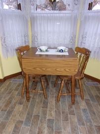 Small kitchen drop leaf table with two chairs