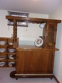 Portable Vintage bar with light, solid oak shelving on it's side. Pool table not for sale.