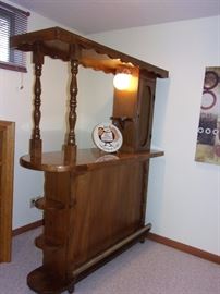 Portable Vintage bar with light, solid oak shelving on it's side. Pool table not for sale.