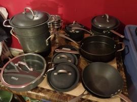 Many pieces of Calphalon cookware - most with lids