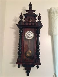 Tall wall mounted French clock with really nice carved case