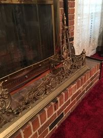 Ornate fire fender with matching andirons