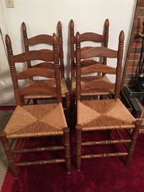 Set of 4 oak ladder back chairs with woven bottoms