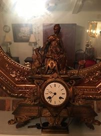 French mantel clock with beautiful detailing....for decorative purposes only...does not run.