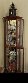 curio cabinet with lots of pretties