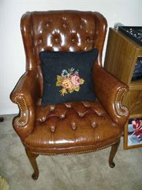 BROWN LEATHER ARM CHAIR
