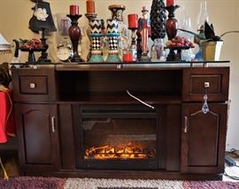 Unique entertainment center with built in electric fireplace