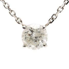 14K White Gold Diamond Pendant Necklace: A 14K white gold diamond pendant necklace. This necklace features an affixed 0.76 ct diamond in a basket setting, suspended from a cable chain.