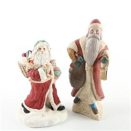 Santa Claus Figures: A selection of Santa Claus figures. This selection of Santa Claus figures features a wood figure Santa Claus carrying a lantern and packages. The base is marked “Jack Hughes 1988.” Also included is a ceramic limited edition Santa Claus carrying packages. The base is marked “Limited Design Corp. number 3078 of 7500, Made in USA.”

A selection of Santa Claus figures. This selection of Santa Claus figures features a wood figure Santa Claus carrying a lantern and packages. The base is marked “Jack Hughes 1988.” Also included is a ceramic limited edition Santa Claus carrying packages. The base is marked “Limited Design Corp. number 3078 of 7500, Made in USA.”