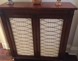 Pair of Antique Mahogany Cabinets w/ Brass Scrollwork Over Cream Pleated Fabric, (34” x 12" x 37”)