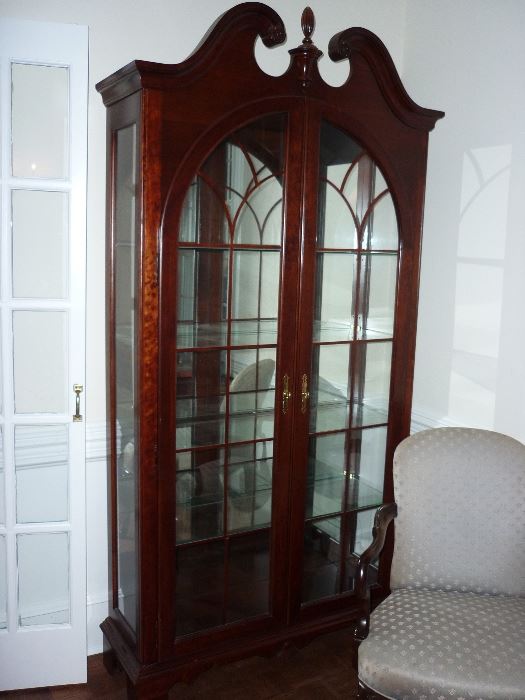 matching pair of curio cabinets