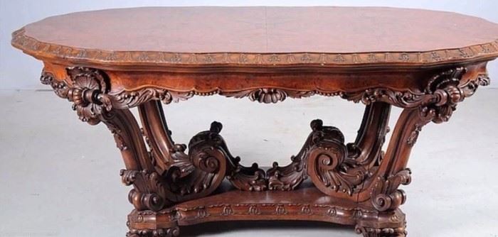 Exceptional heavily carved dining table