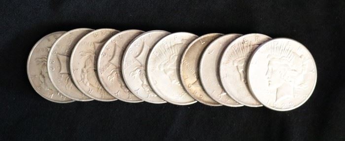 Over 50 Peace silver dollars