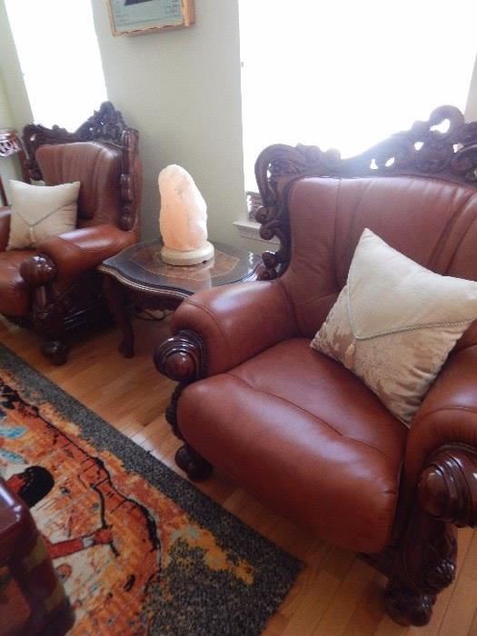 Two leather club chairs in excellent condition.
