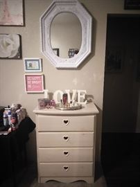 Cute little dresser with heart pulls, perfume and wall art as well!
