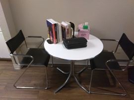 Cute little table and chairs.