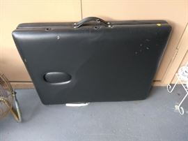 Folding travel massage table, in great condition with a few little scratches.