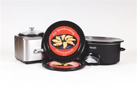 Cuisinart Rice Cooker and Crockpot Slow Cooker: A grouping of small kitchen appliances including a Cuisinart rice cooker, a 5.5-quart programmable Crock-Pot slow cooker (model number SCCPVP550-B) and 12.5" round metal cooking trays.